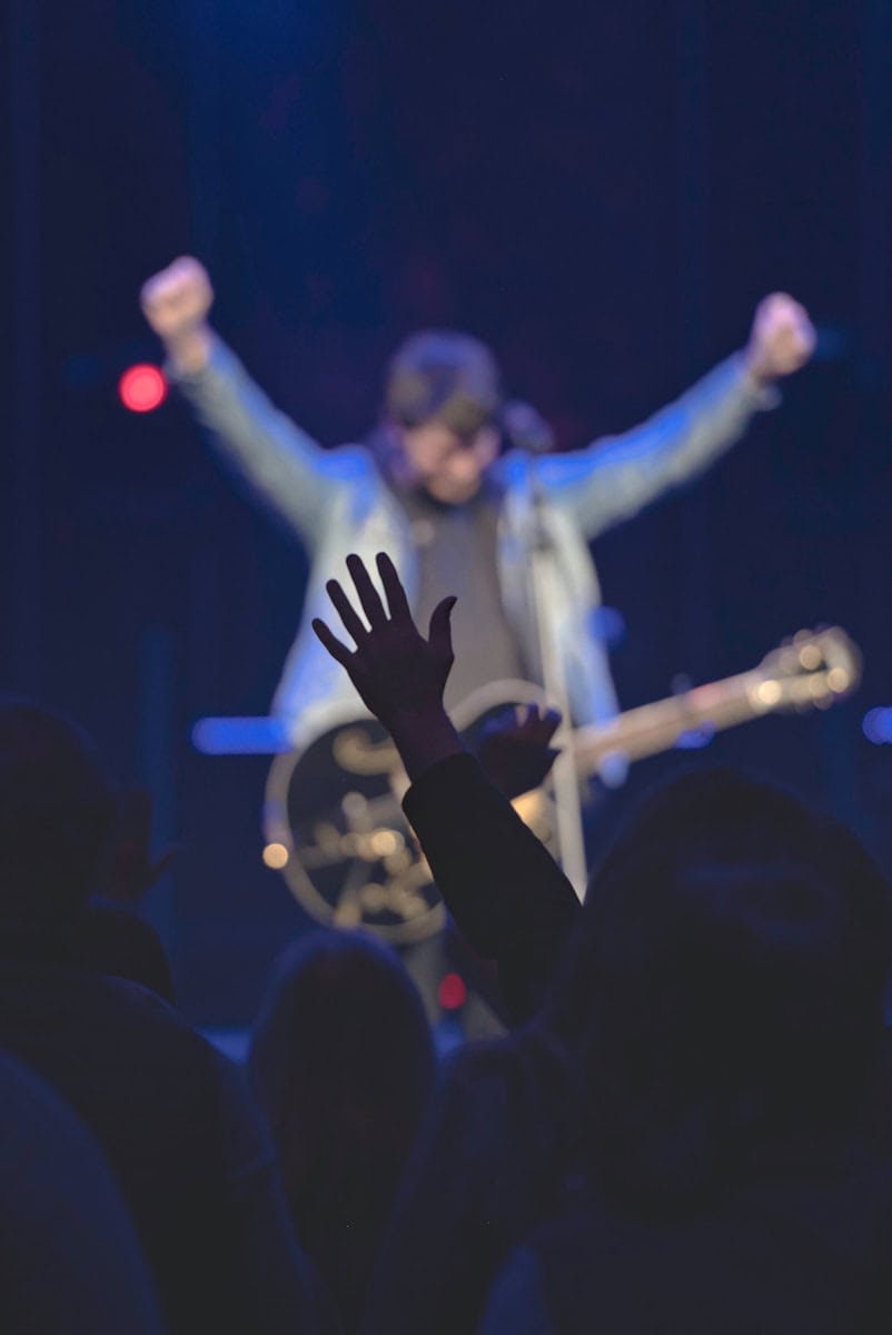 people raising hands